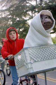 Elliott (HENRY THOMAS), his brother and friends ride as fast as they can to get E.T. back to the forest. 1982Credit: Credit: Universal/Neal Peters Collection
